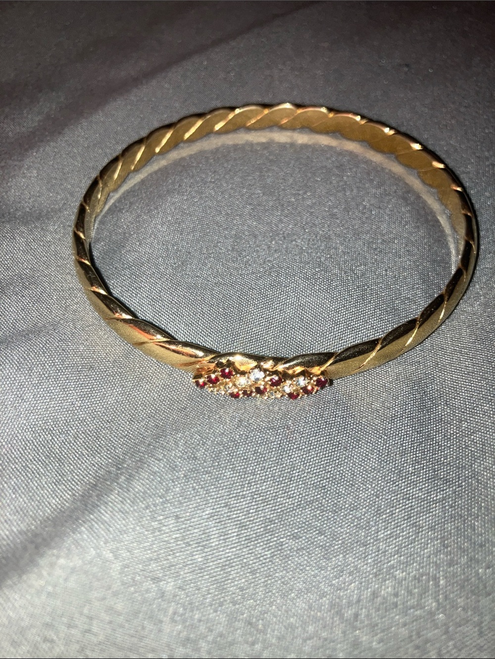 Gold Bangle Bracelet with ruby red and crystal stones